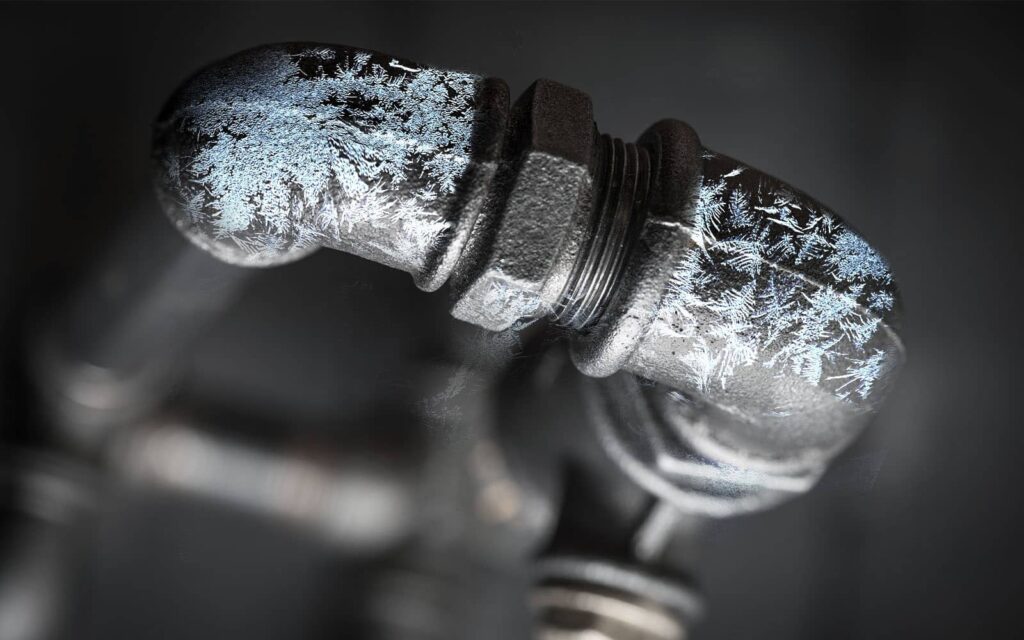Close-up of a frozen plumbing pipe