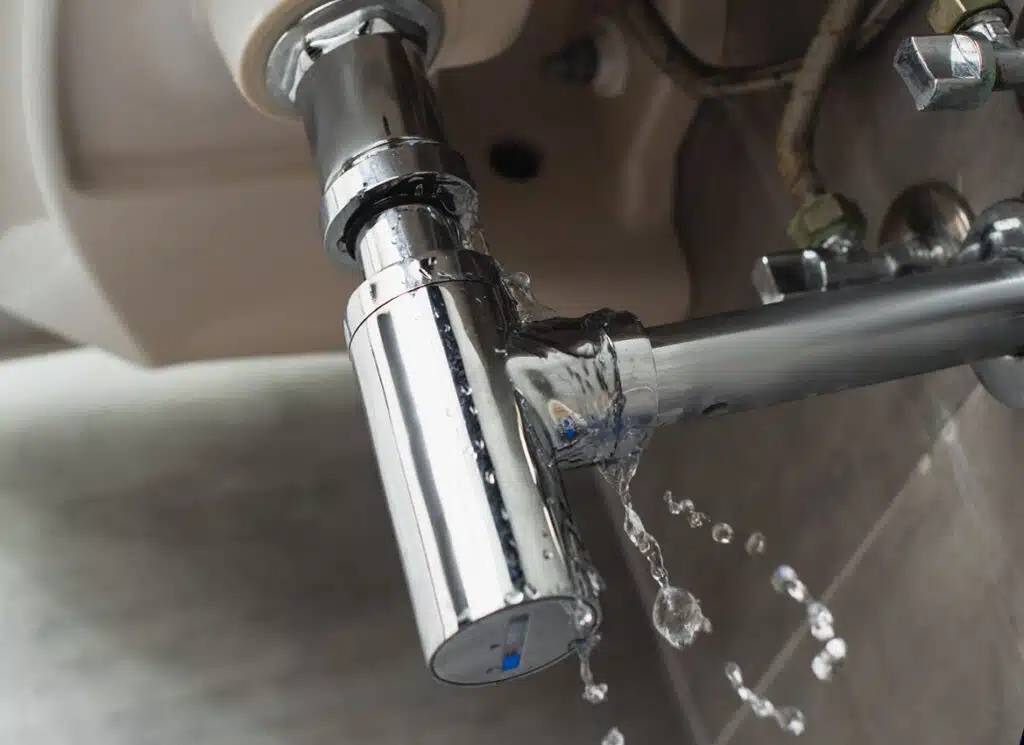 Close-up of plumbing pipes during a residential plumbing repair